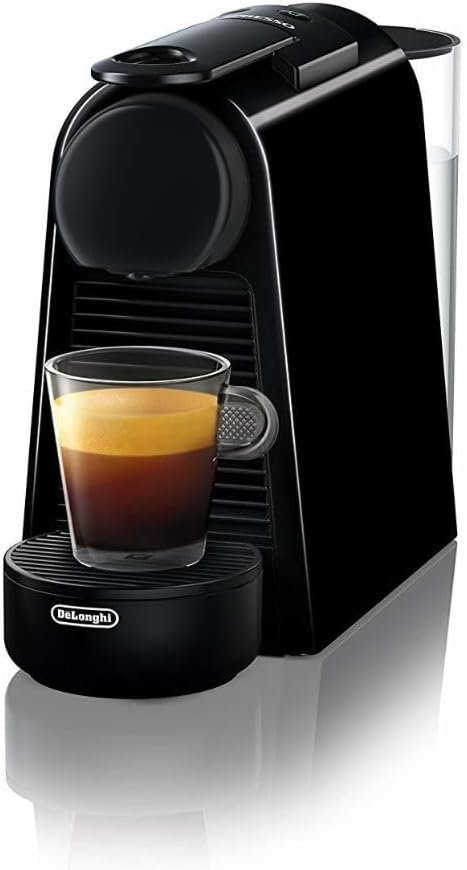 Black De’Longhi single-serve pod espresso machine with a small glass espresso, featured in a Quiet Coffee Makers for Couples roundup.